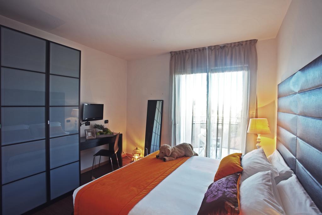D-Place Hotel & Suite Ричоне Стая снимка